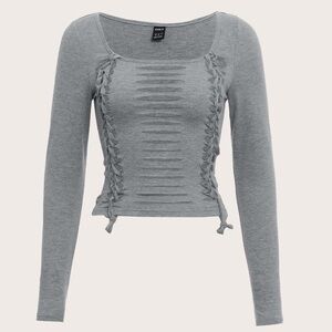 Gray long sleeve top with cut out details